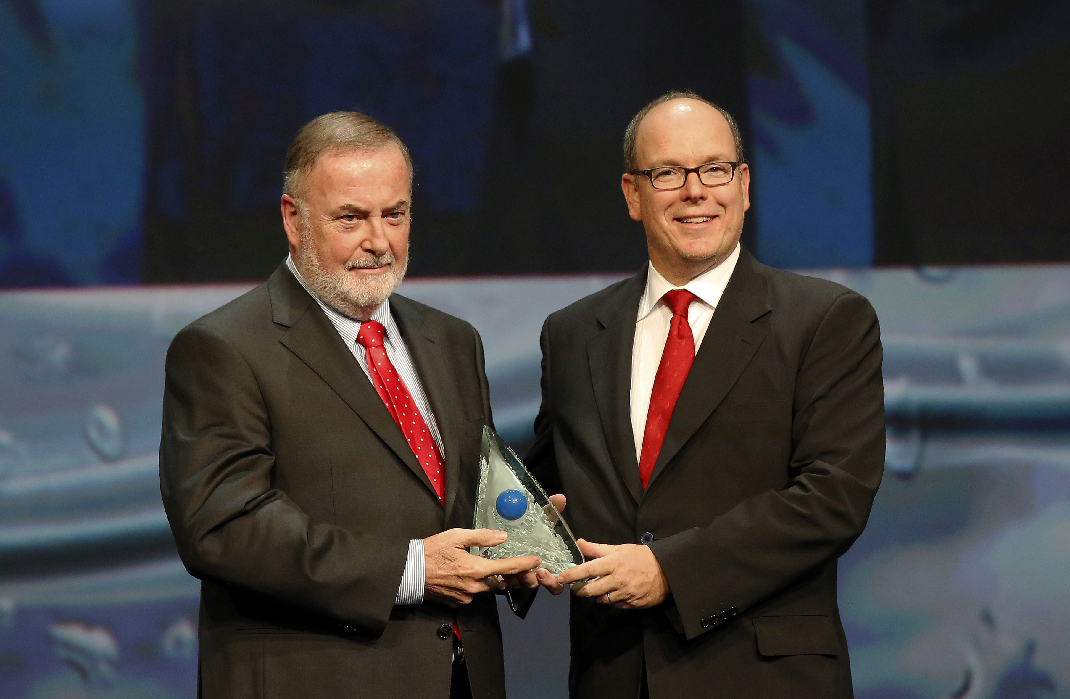 Prince Albert II of Monaco awards the Water prize to Loïc Fauchon, honorary president of the World Water Council and CEO of the Société des Eaux de Marseille, during the 8th awards ceremony of the Prince Albert II of Monaco Foundation at the Monaco Grimaldi Forum, October 2, 2015. Photo © JC Vinaj 