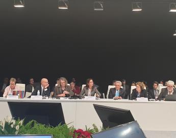 Vice-President Asma El Kasmi surrounded by Honorary President Benedito Braga and Governor Jean Lapègue, during the Roundtable on SDG6 - Building a Resilient Future Through Water, COP25, Madrid, 9 December 2019